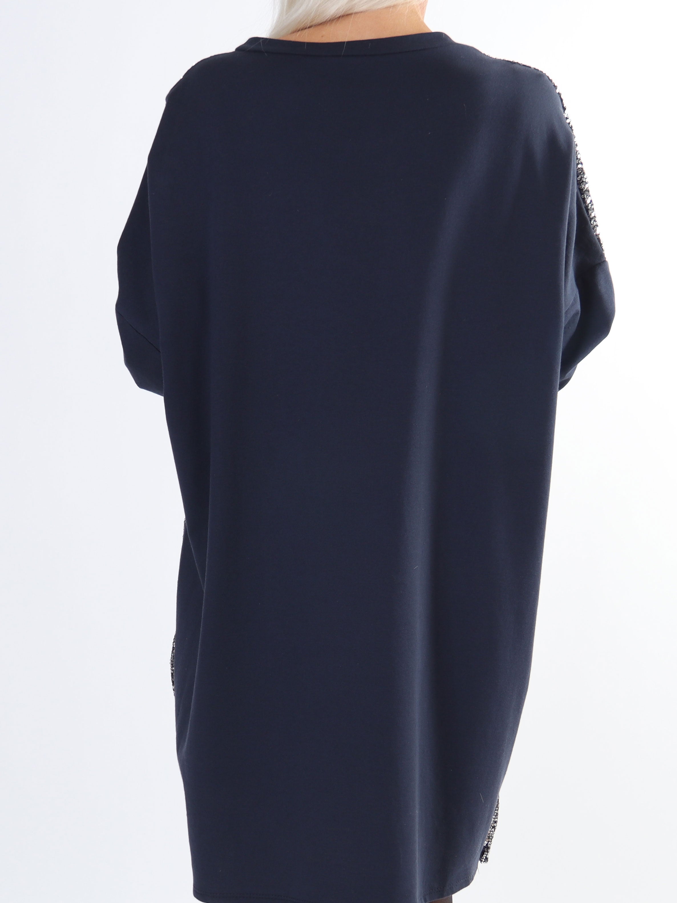 Eria - Klänning i stora storlekar med paljetter framtill